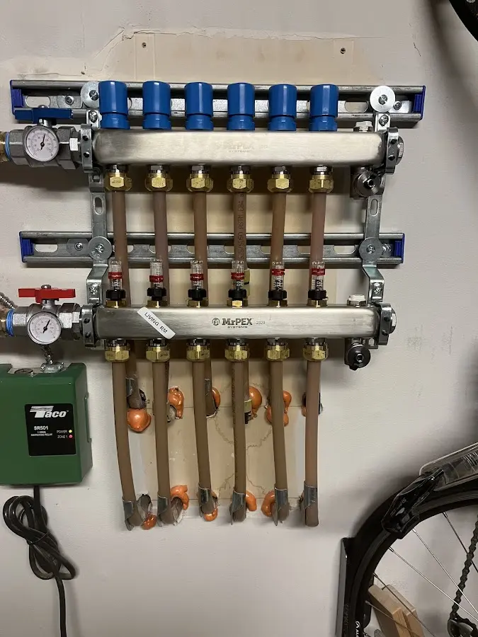 Plumber performing Leak Detection at a residential property in Clemmons